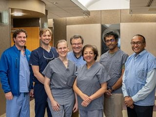 group photo of prosthetic arm clinical team